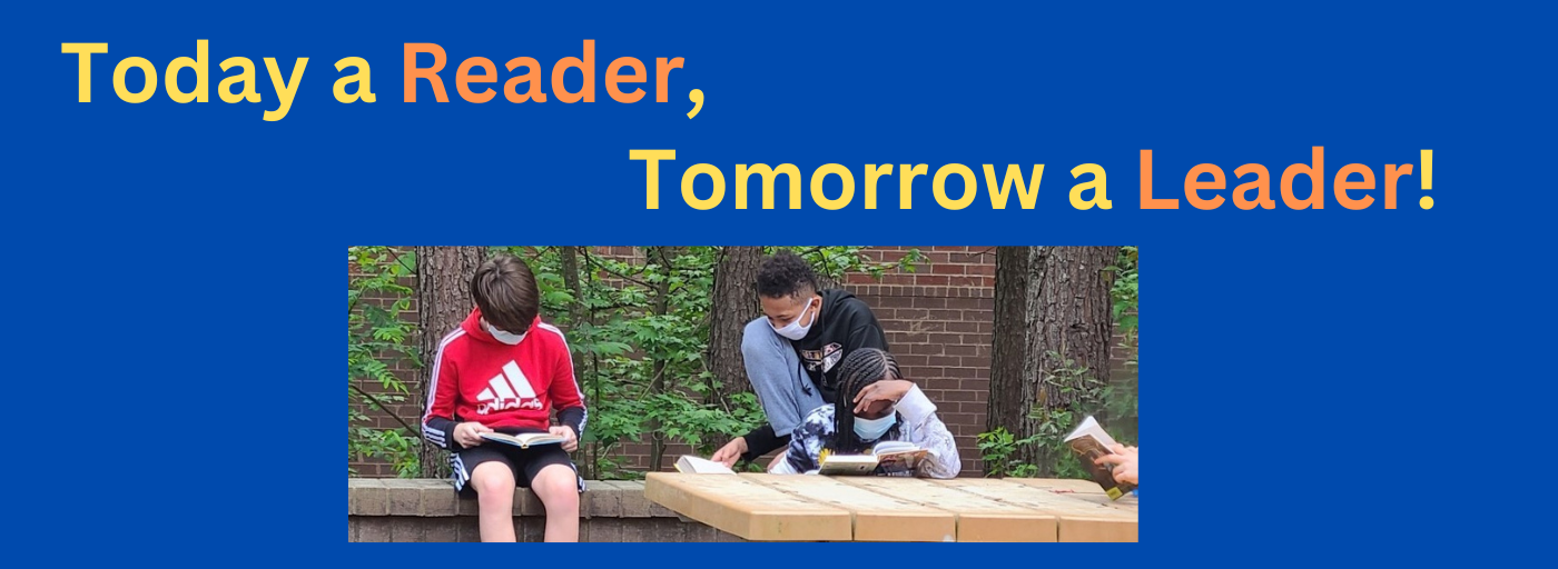 Students reading on the patio.  Today a Leader, tomorrow a leader.
